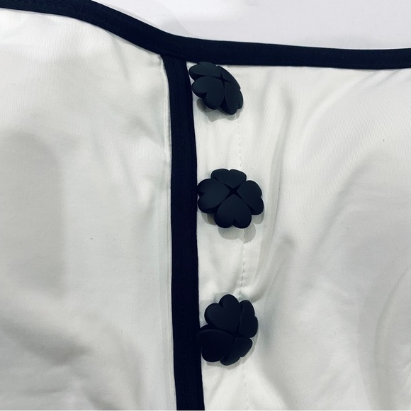 Kate Spade Texture Classic Bandeau Swimsuit with signature spade buttons - Picture 7 of 8